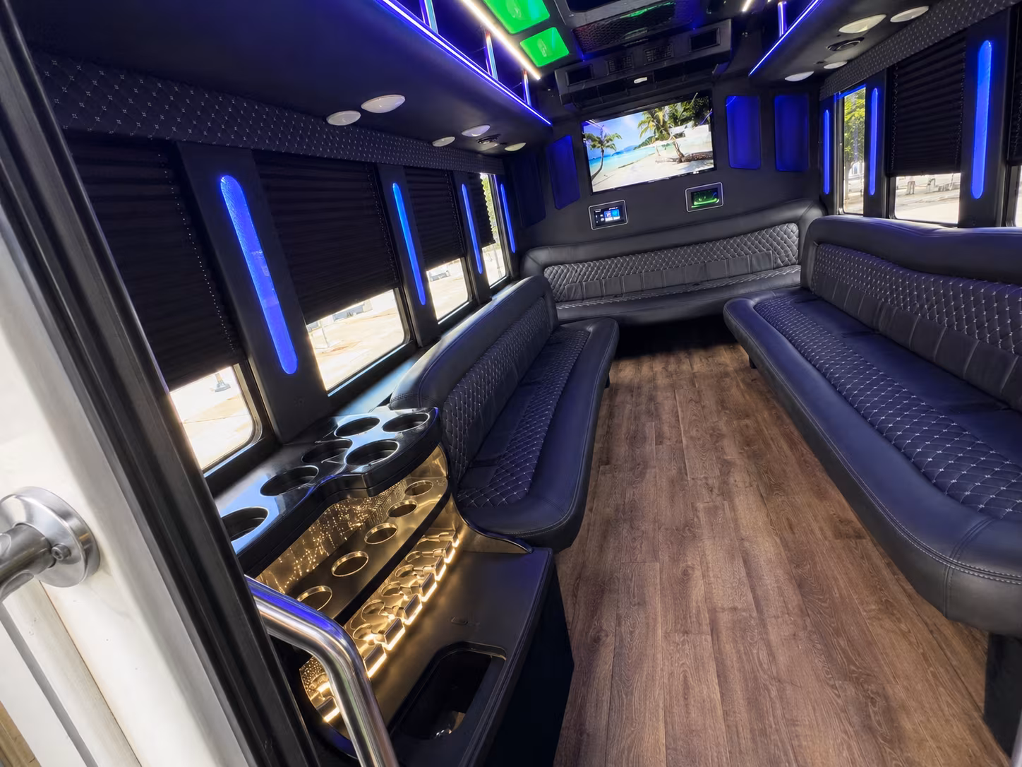 Group beside a Mercedes Sprinter limo in Riverside